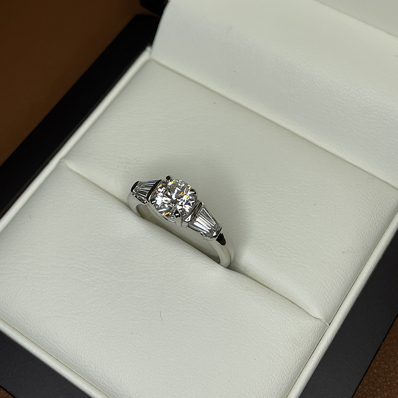 Round and Tapered Baguettes Lab Grown Diamond Engagement Ring