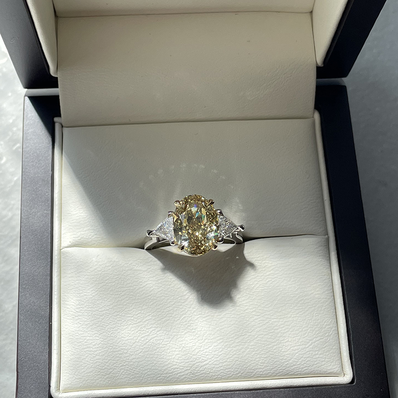 Yellow Oval Lab Grown Diamond Triangle Side Engagement Ring