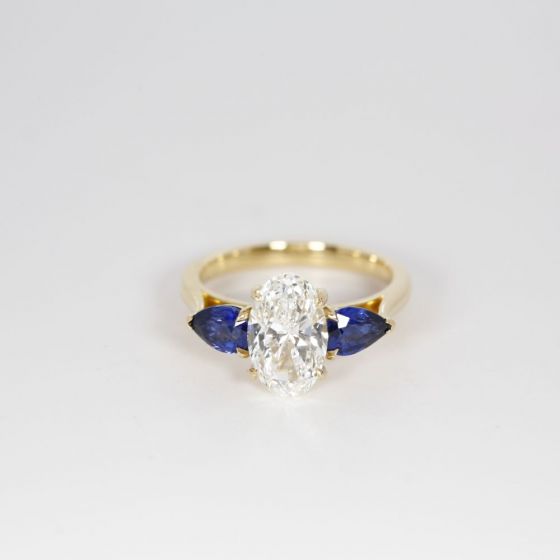 Diamond ring with on sale sapphire side stones