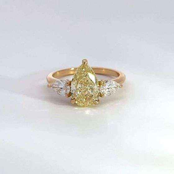 Yellow gold pear shaped engagement ring top