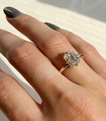 Compass Setting Emerald Cut Diamond Engagement Ring