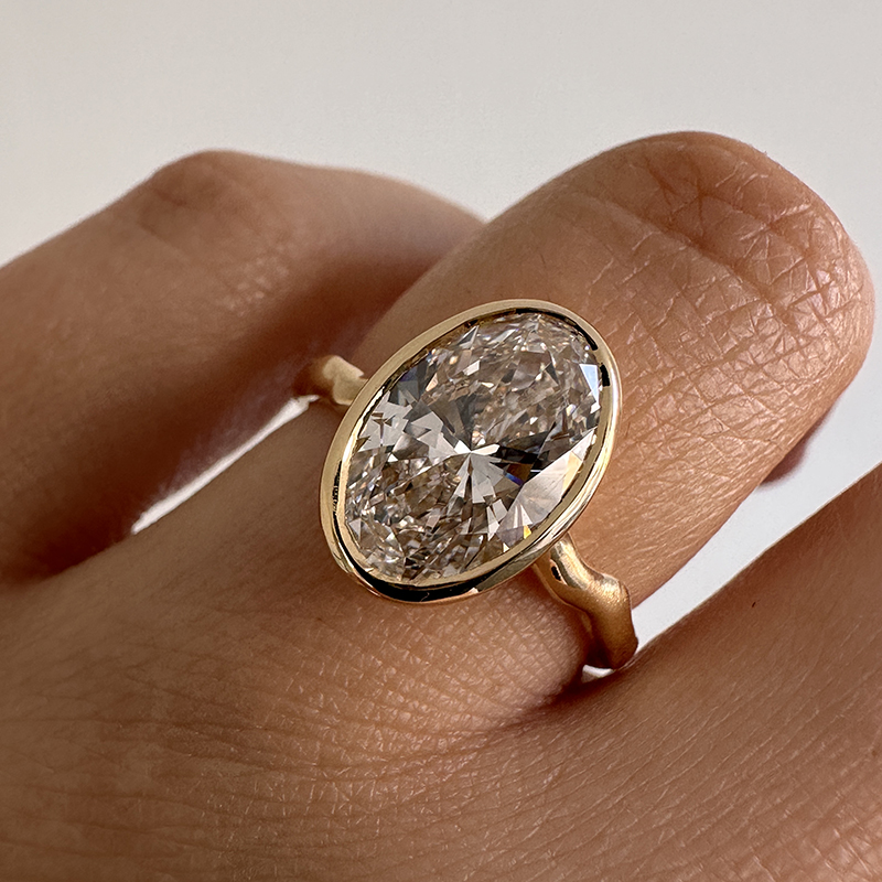 Bezel Oval Contemporary Diamond Engagement Ring